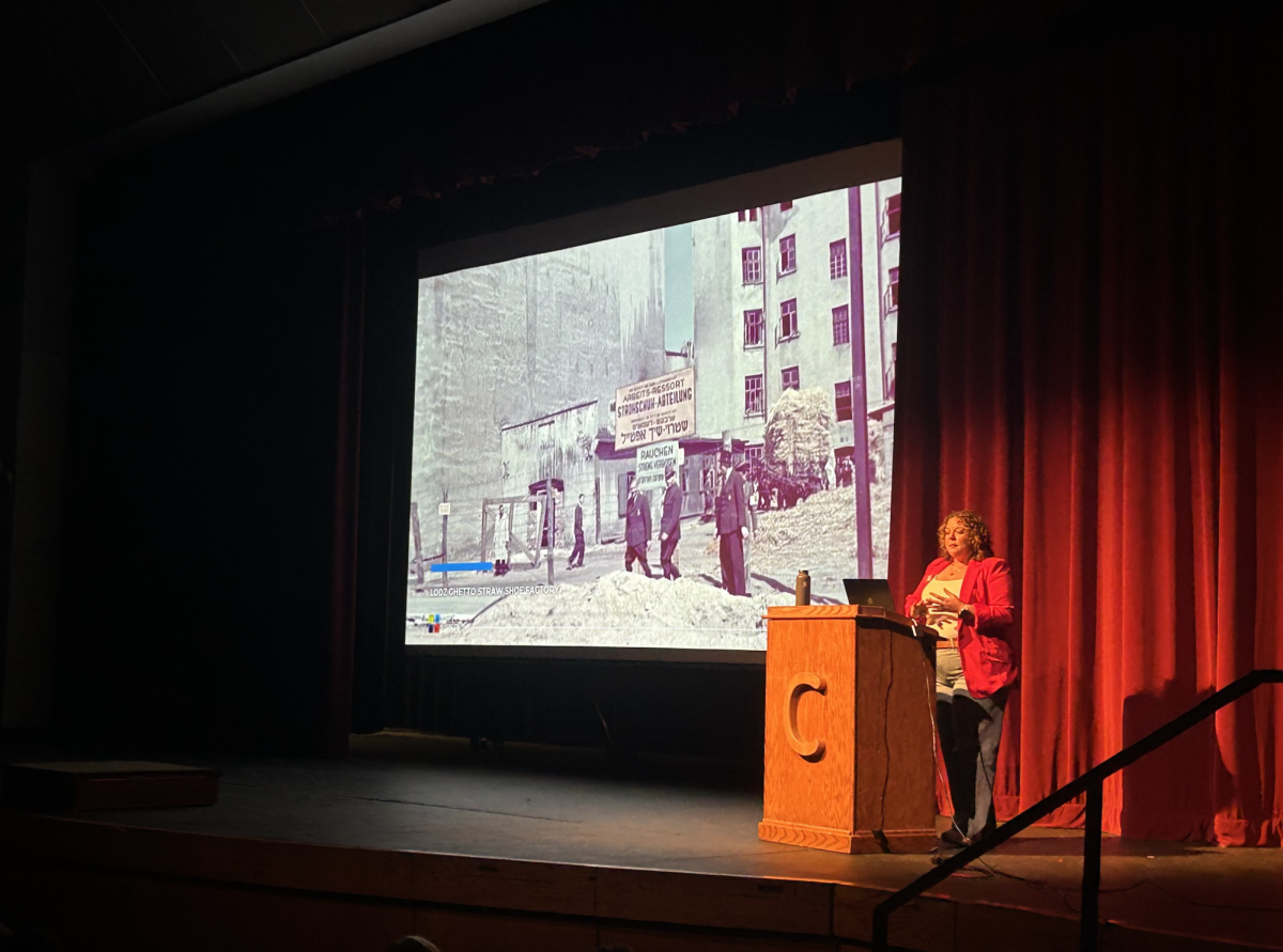A video plays on the screen of Jack Adler's story in Centaurus' theather.